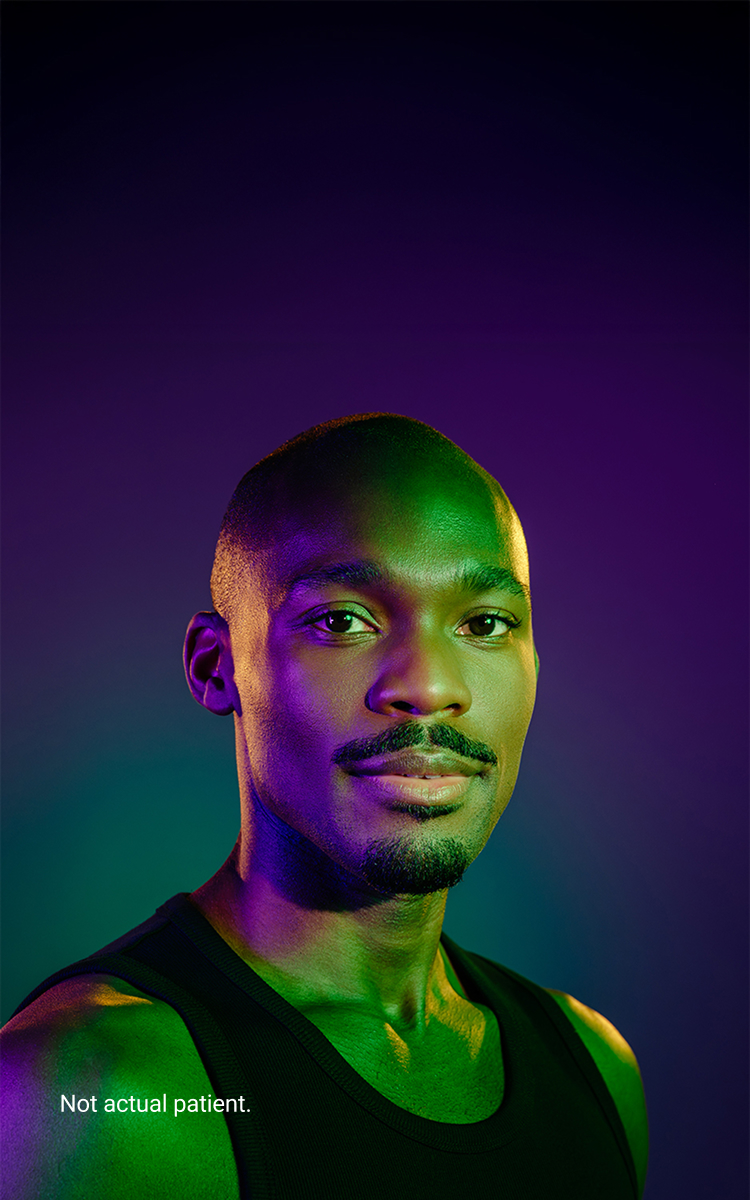 Banner image of a young Black male on a purple background. Not an actual patient.