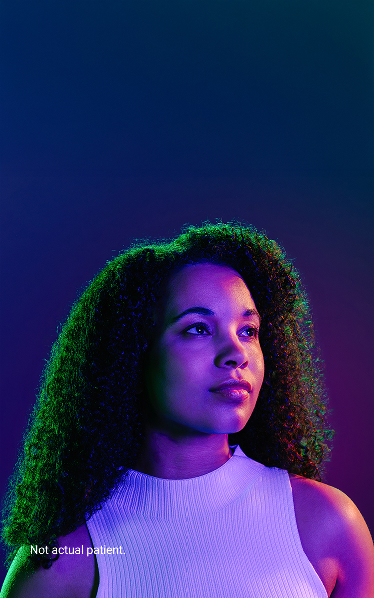 Banner image of a Black woman on a purple background. Not an actual patient.